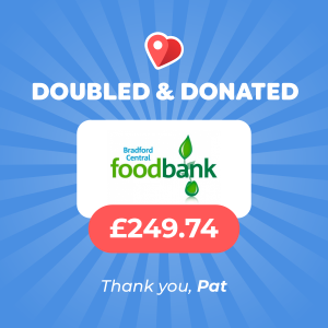 Pick My Postcode winner, Pat, donates to Bradford Food Bank charity