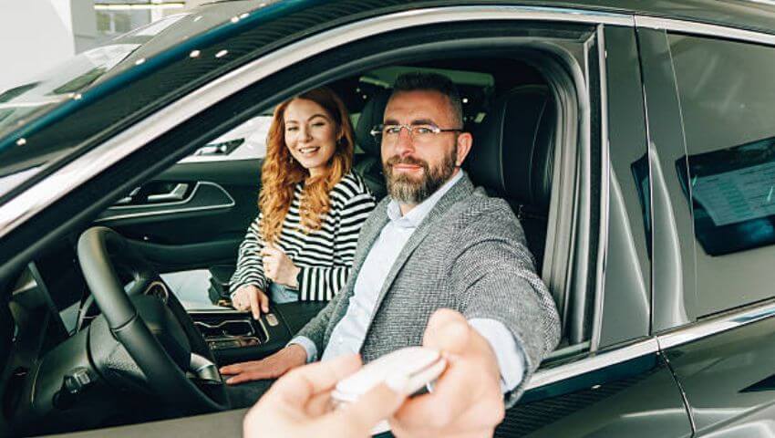 Man and Lady in a car